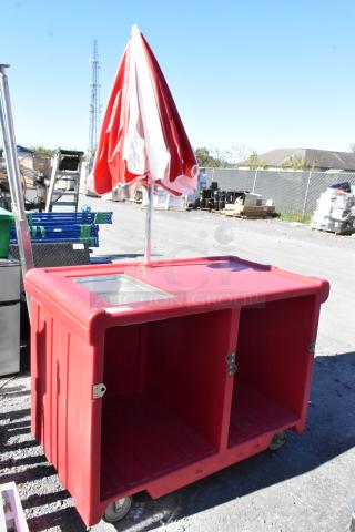 Cambro red poly portable work station with umbrella, stainless steel sink, on commercial casters. Good condition.