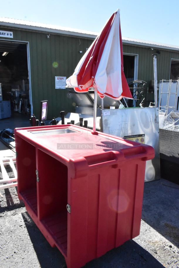 Cambro red poly portable work station with umbrella, on commercial casters, durable condition.