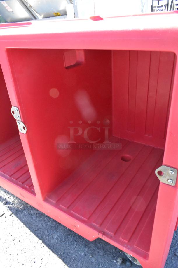 Cambro red poly portable work station with umbrella slot, on commercial casters. Good condition, durable construction.