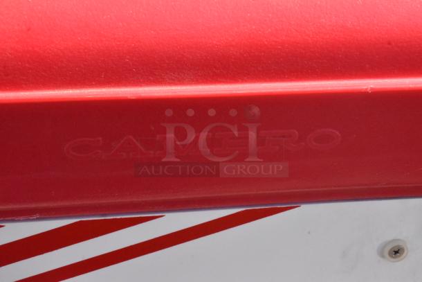 Cambro red poly portable work station, durable design, includes umbrella, commercial casters for mobility, brand marking visible.