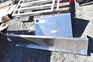 Two metal wall mount shelves with visible tags. Includes 48x12x12 size. Used condition. Labels show item 156 and caution symbol.