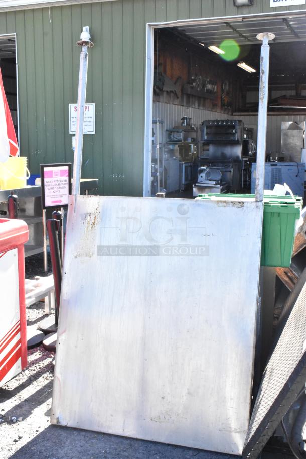 Stainless steel panel with rectangular shape, slight rust marks, and sturdy build. Used condition, ideal for industrial use.
