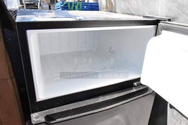 Galanz GLR31TS1E02 mini cooler with freezer, 115 volts, open door showing interior. Clean and in good condition.