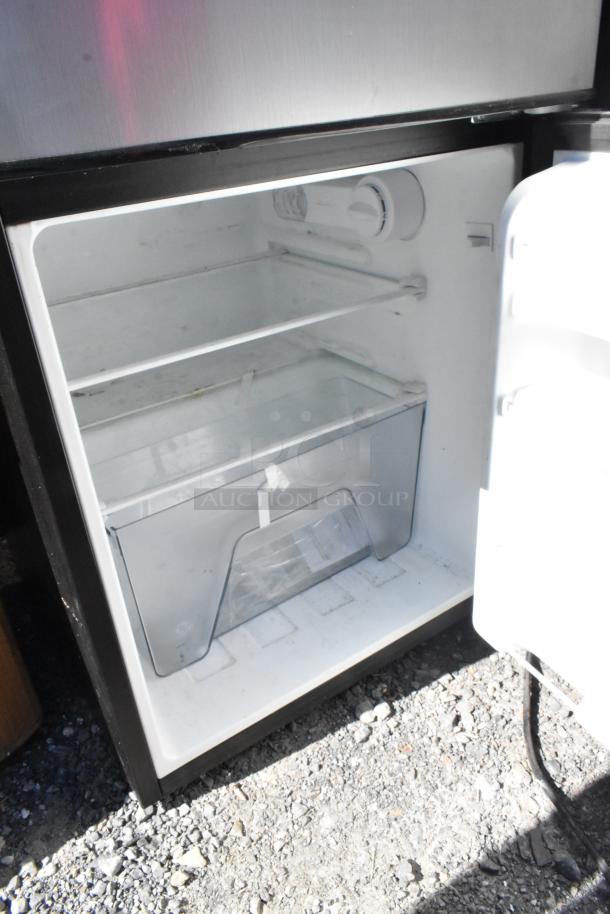Galanz GLR31TS1E02 Mini Cooler with Freezer. Stainless steel finish, spacious interior, 115 Volts, 1 Phase.