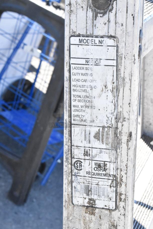 6' Louisville A Frame Ladder, visible wear, meets OSHA standards, model and specifications label shown.
