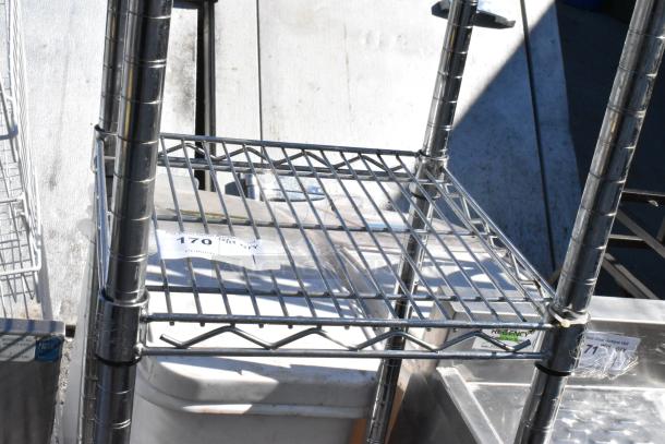 Chrome finish 3-tier wire shelving unit, metal frame, requires buyer dismantling, freight charges apply.