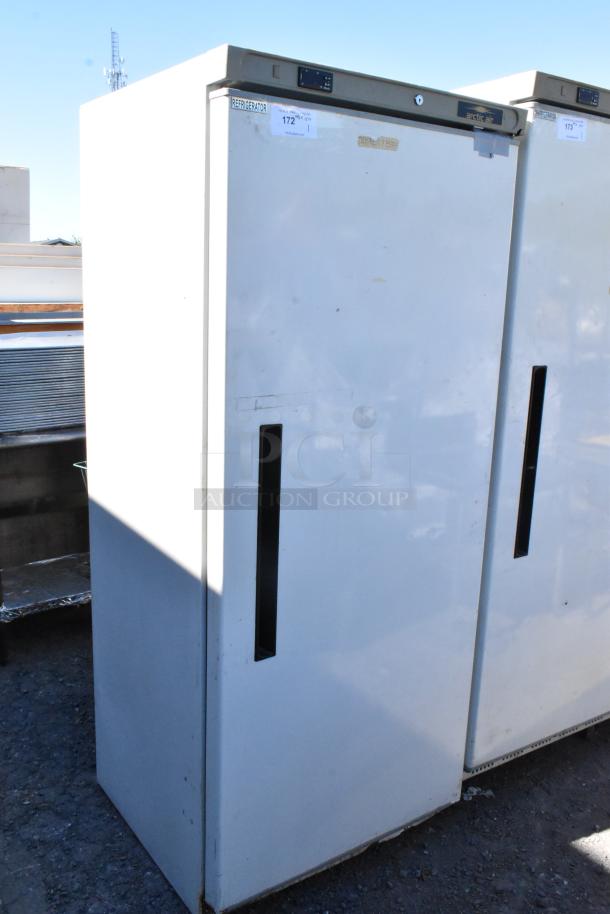Arctic Air AWR25 single door reach-in cooler, metal exterior, 115 volts, 1 phase, visible wear and markings.