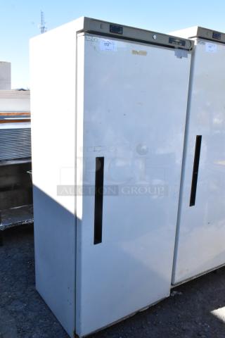 Arctic Air AWR25 single door reach-in cooler, metal exterior, 115 volts, 1 phase, visible wear and markings.