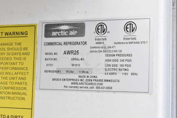 Arctic Air AWR25 single door reach-in cooler label, detailing model, refrigerant type, and electric rating.