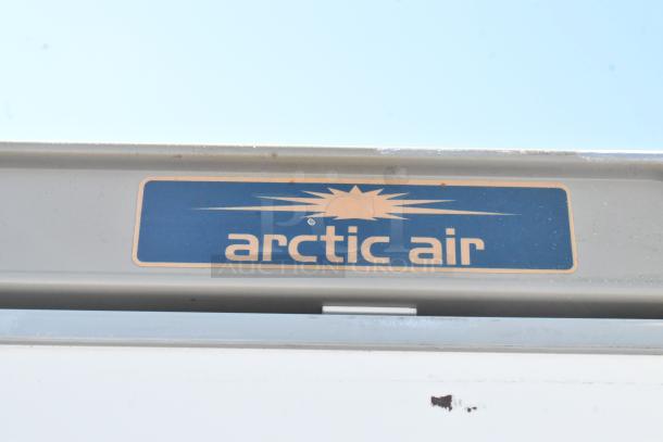 Arctic Air AWR25 metal single door reach-in cooler, features visible brand logo on top. 115 volts, 1 phase.