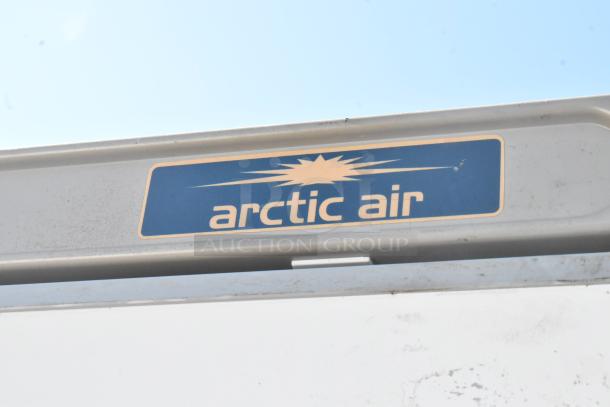 Arctic Air AWR25 metal single door reach-in cooler, 115 volts, 1 phase, Arctic Air logo visible on the door.
