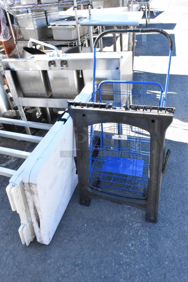 Four items: folding table, sign, saw horse, and wire basket. Used condition. Ideal for versatile applications.