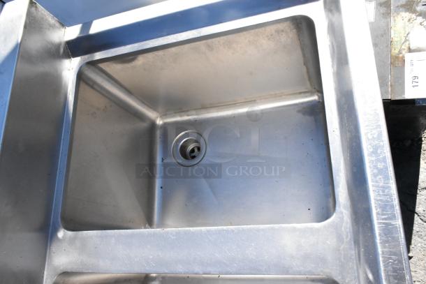 Stainless steel 3 bay sink with a glass washer, in good condition. Minor surface marks visible. Suitable for commercial use.