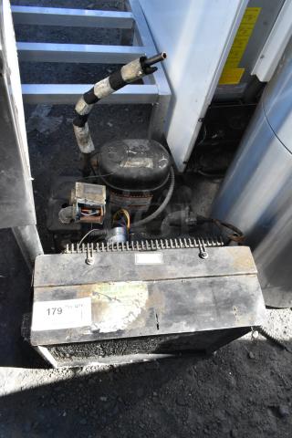 Tecumseh Compressor, used condition, visible wear. Includes attached wires and hoses. Number label "179".