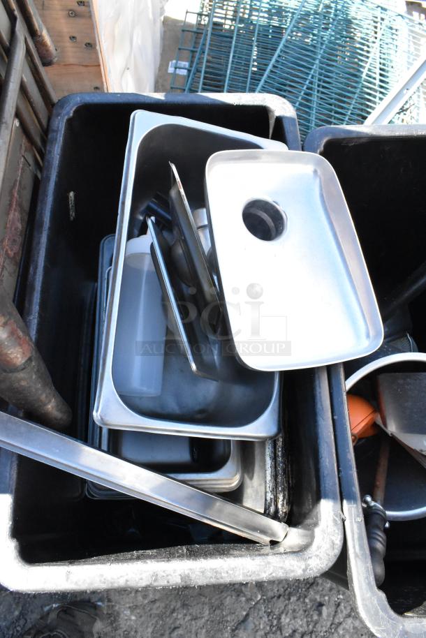 Three Poly Slim Jim trash cans filled with assorted metal trays and utensils, used condition.