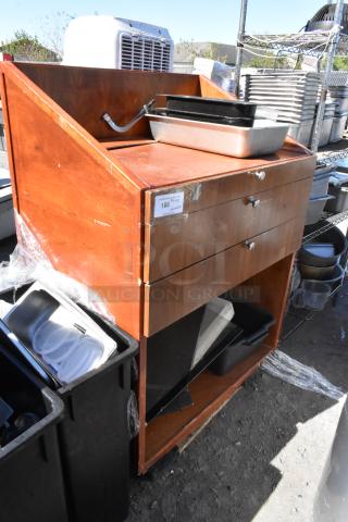 Wood pattern stand with two drawers, fair condition, includes label "186," some surface scratches and installed trays.