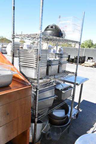 Chrome finish 4-tier wire shelving unit with stainless steel drop-in bins. Buyer must dismantle. Consider freight charges.