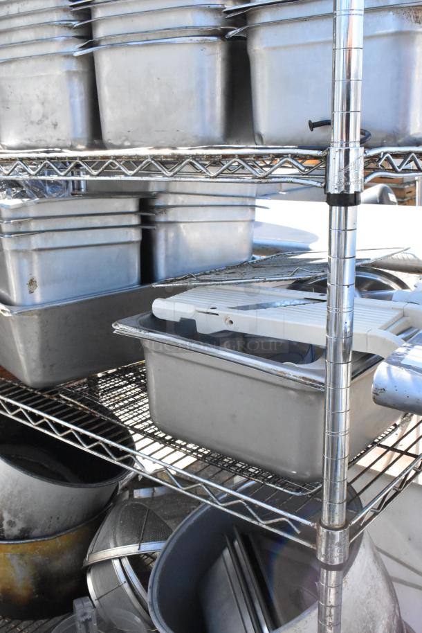 Chrome finish 4-tier wire shelving unit with stainless steel drop-in bins. Buyer must dismantle. Consider freight charges.