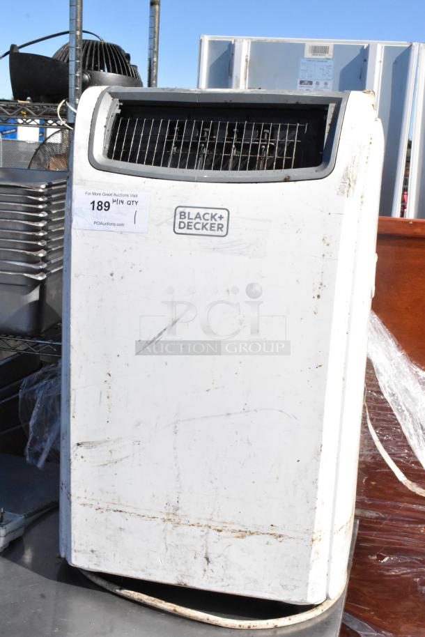 Black & Decker BPACT14H portable air conditioner, 115 volts, 1 phase, visible wear, Black & Decker logo on front.