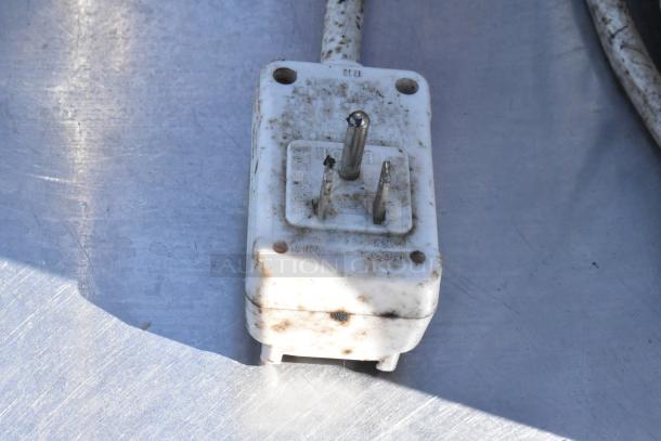 Dirty power plug of a Black & Decker BPACT14H portable air conditioner. 115V, 1 Phase, moderate wear.
