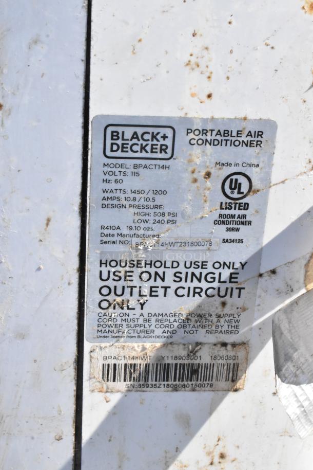 Black & Decker BPACT14H Portable Air Conditioner, 115V, model info on label. Visible wear and dirt on surface.
