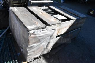 Brand new crate with 10 Anthony doors, size 23-1/8"x60". Visible labels indicate item details and quantity.