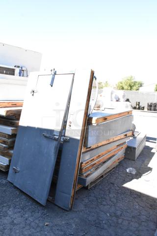 Norlake self-contained walk-in freezer, model CPF060DC-A, 115/208-230V, 1 phase, with compressor, unassembled panels visible.