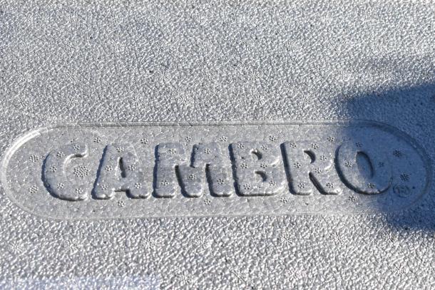 Cambro Black Insulated Box with embossed logo branding, textured surface, durable for temperature retention.
