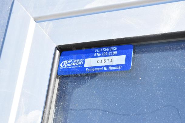 Bally Walk In Box tag indicating Air Comfort Refrigeration Corp, service number, and equipment ID: 01671.