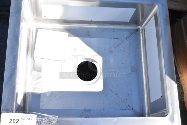 Brand new KoolMore MPS-1922123 stainless steel mop sink with scratches and dents. Square basin, clean surface with visible drain.
