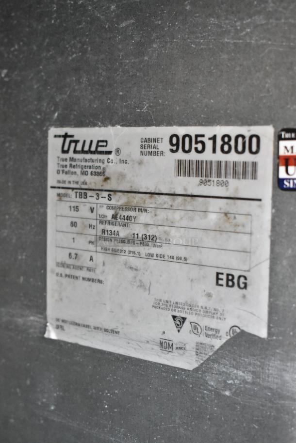 True TBB-3-S stainless steel cooler label with 115V, model and serial number details, showing compressor and refrigerant info.