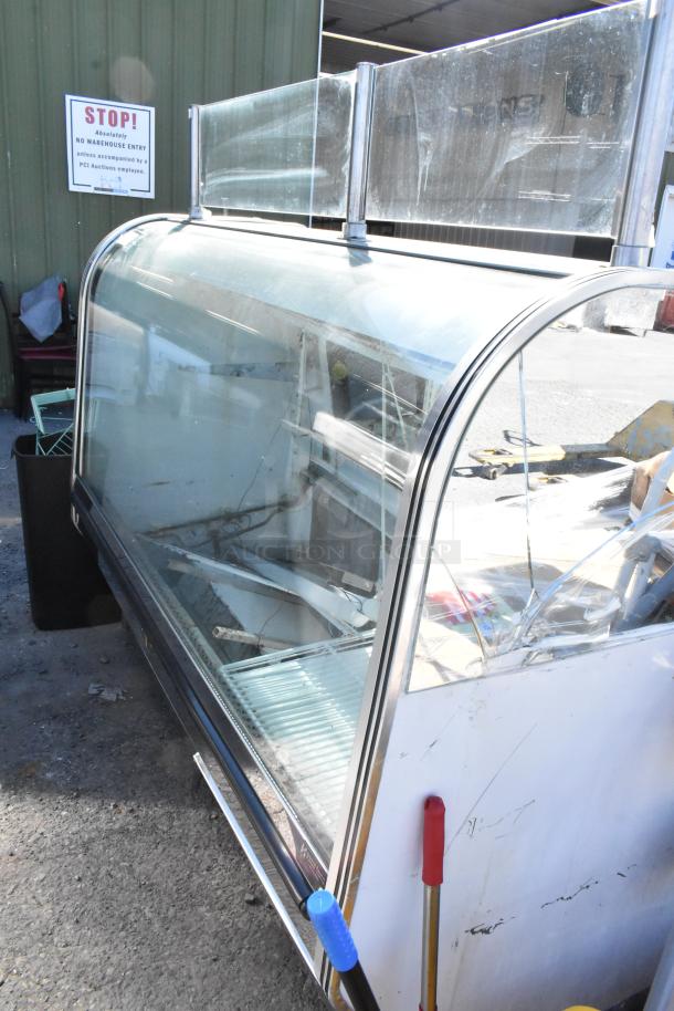 Marc Metal floor-style deli display case, glass front, metal finish, used condition, ideal for commercial food displays.