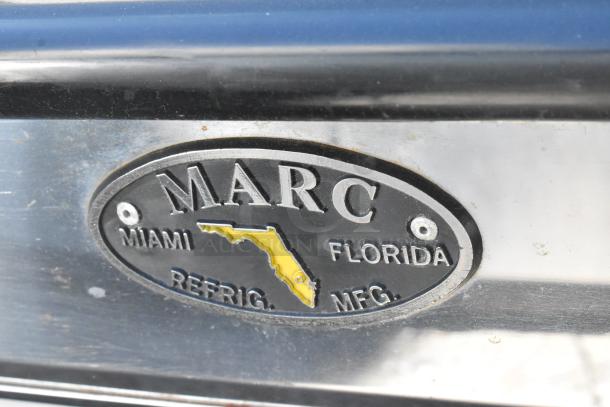 Marc Metal Commercial Deli Display Case, featuring Miami, Florida label. Durable, sleek design ideal for merchandising. Good condition.