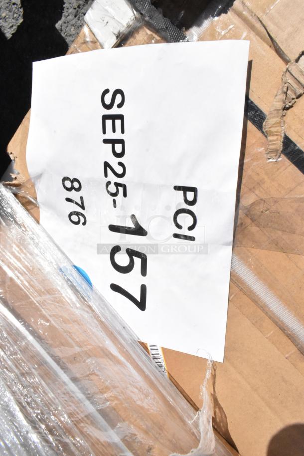 Cardboard packaging with visible label: "PCI SEP25-157 876." Contains 5 brand new scratch-and-dent work tables.