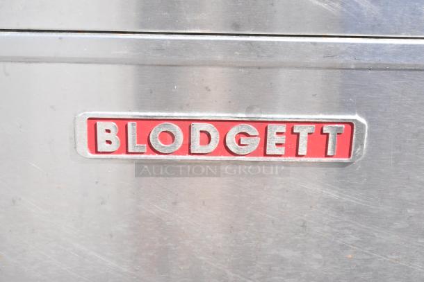 Blodgett stainless steel conveyor pizza oven with commercial casters, electric-powered, 208-240V, 3-phase.