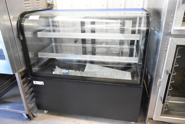 Avantco 193BCD48B metal commercial dry display case merchandiser, floor style, glass shelves, 115V, 1 phase, excellent condition.