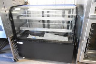 Avantco 193BCD48B metal commercial dry display case merchandiser, floor style, glass shelves, 115V, 1 phase, excellent condition.
