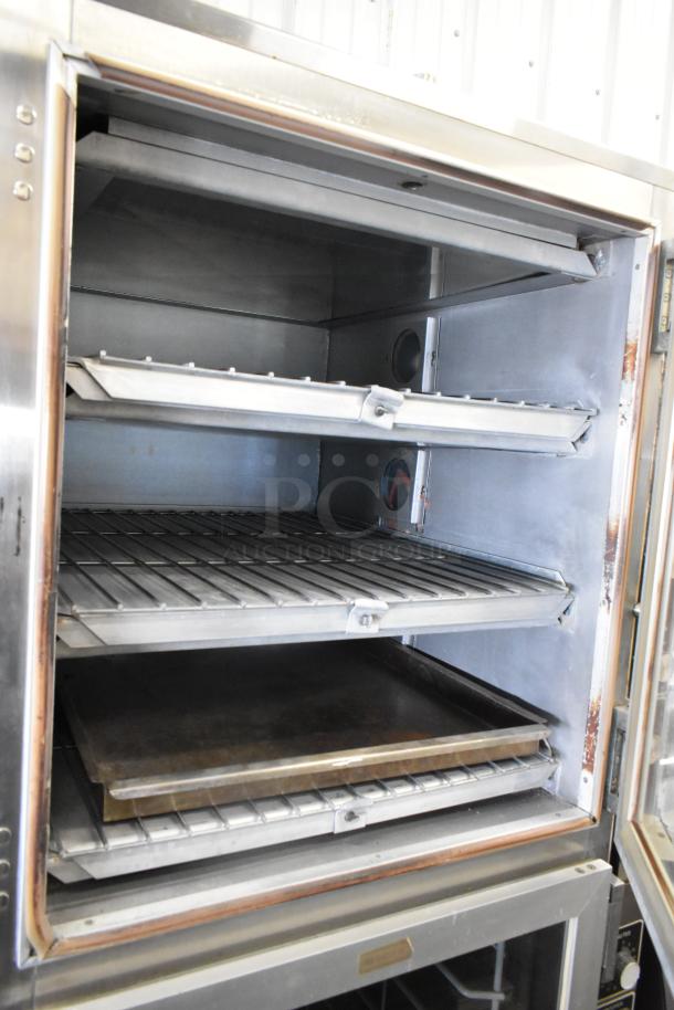 SuperSystems OP-3 stainless steel electric oven proofer, 120/208V, 3 phase, in good condition with three wire racks.