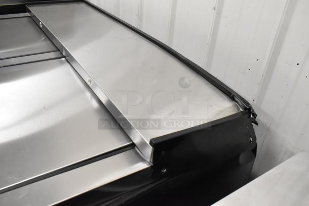Brand new 2025 True TD-50-18-HC back bar cooler, metal construction, two sliding lids, scratch and dent condition.