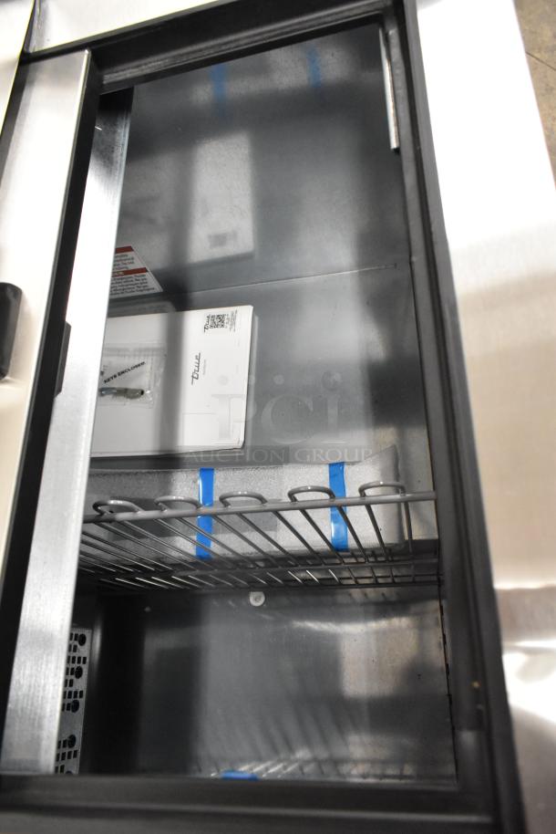 Brand new 2025 True TD-50-18-HC back bar bottle cooler with 2 sliding lids, scratch and dent condition, 115V, 1-phase.