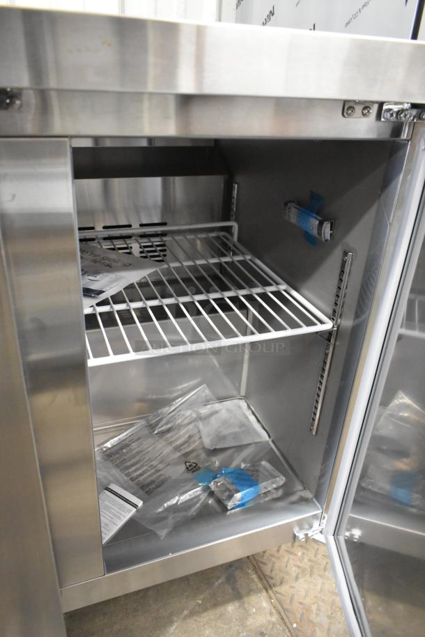 Brand new 2025 Avantco 178SSUC36RHC stainless steel 2-door undercounter cooler, 115V, with visible tags and protective packaging.