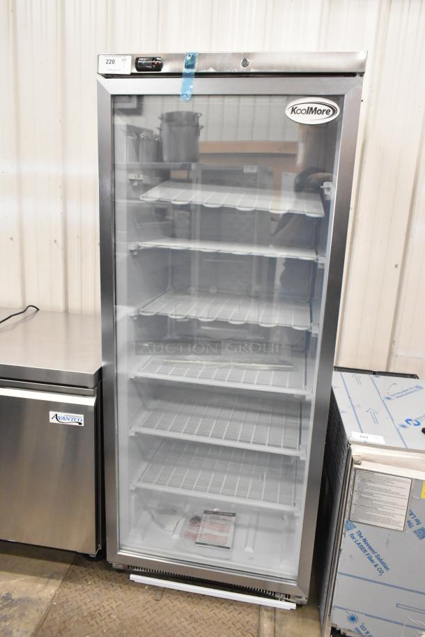 Brand new KoolMore KM-FMD20SGD commercial single door cooler with poly-coated racks, 115V, minor scratches.