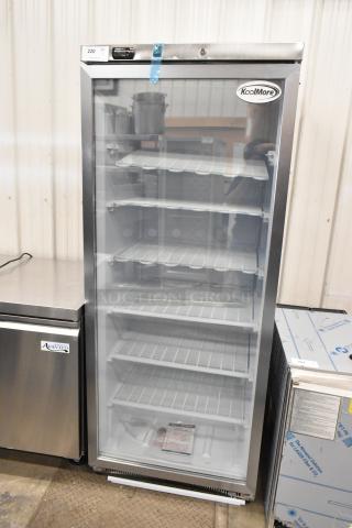 Brand new KoolMore KM-FMD20SGD commercial single door cooler with poly-coated racks, 115V, minor scratches.