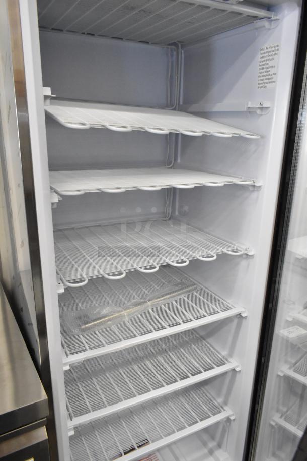 Brand new KoolMore KM-FMD20SGD single door cooler merchandiser with poly coated racks, 115V, scratch and dent condition.