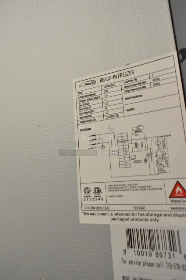 KoolMore KM-FMD20SGD commercial cooler tag, showing specifications, certifications, and circuit diagram detail.