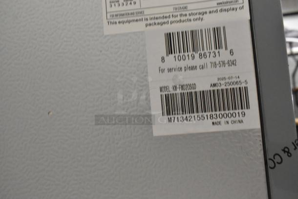 BRAND NEW KoolMore KM-FMD20SGD cooler, model tag shown. Scratch and dent condition. 115V, 1 Phase. Made in China label.