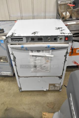 Brand new Champion UH130B-70 stainless steel high-temperature undercounter dishwasher, 208/240V, 1 phase, with visible dents.