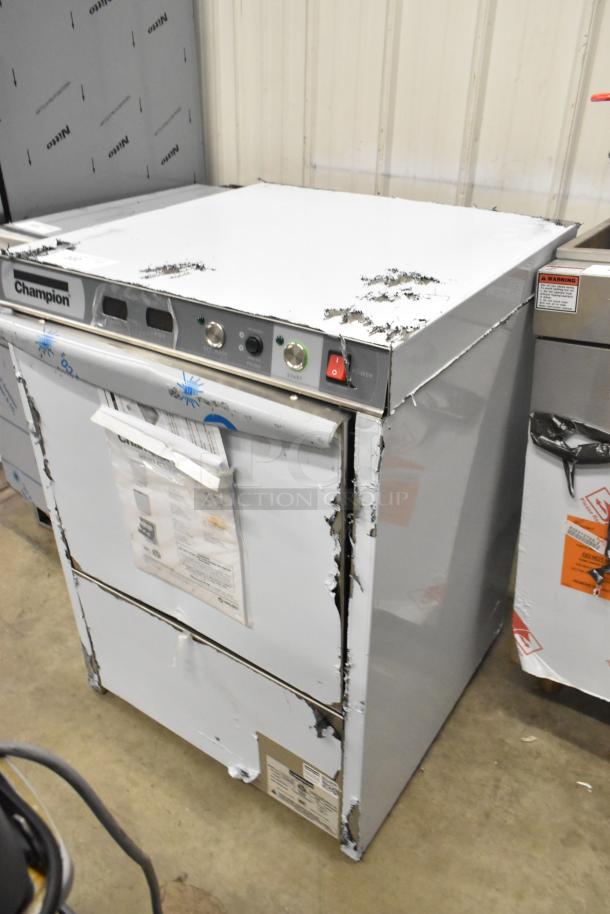 Brand new 2025 Champion UH130B-70 stainless steel undercounter dishwasher with visible scratches and dents, 208/240V, 1 phase.