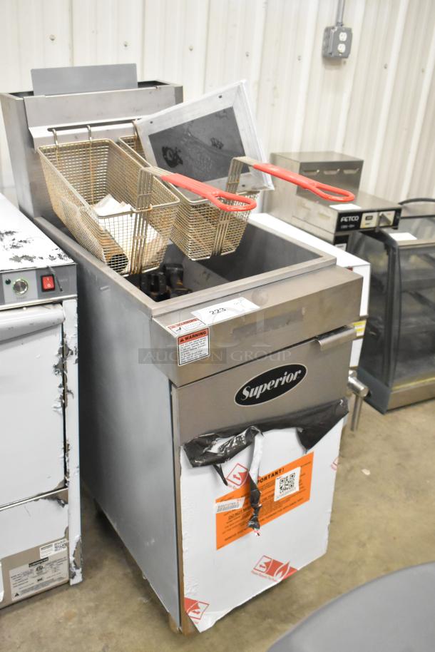 Brand new Superior LG300-6 stainless steel propane deep fryer, scratch and dent, with 2 metal fry baskets, 90,000 BTU.