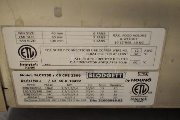 BRAND NEW Blodgett BLCP23E stainless steel commercial combi convection oven, 208/230-240V, 3 phase, model plate details.